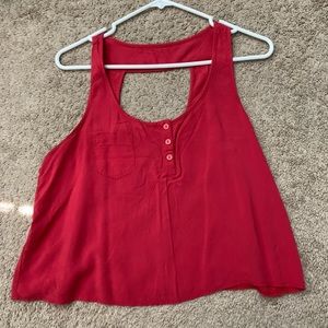 red tank top with button up, pocket and open back